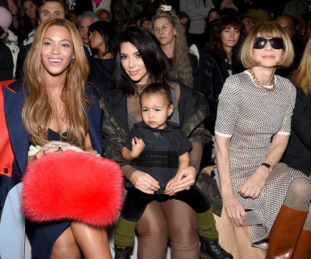 beyonce-kim-kardashian-with-daughter-north-and-anna-wintour-attend-the-adidas-originals-x-kanye-west-yeezy-season-1-fashion-show-during-new-york-fashion-week-2015-getty__large